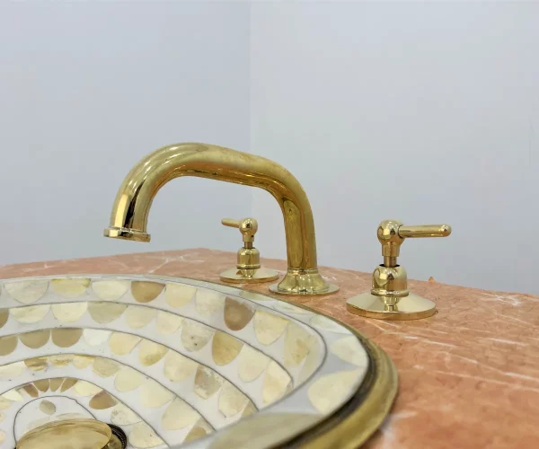 widespread bathroom faucet with various brass handles